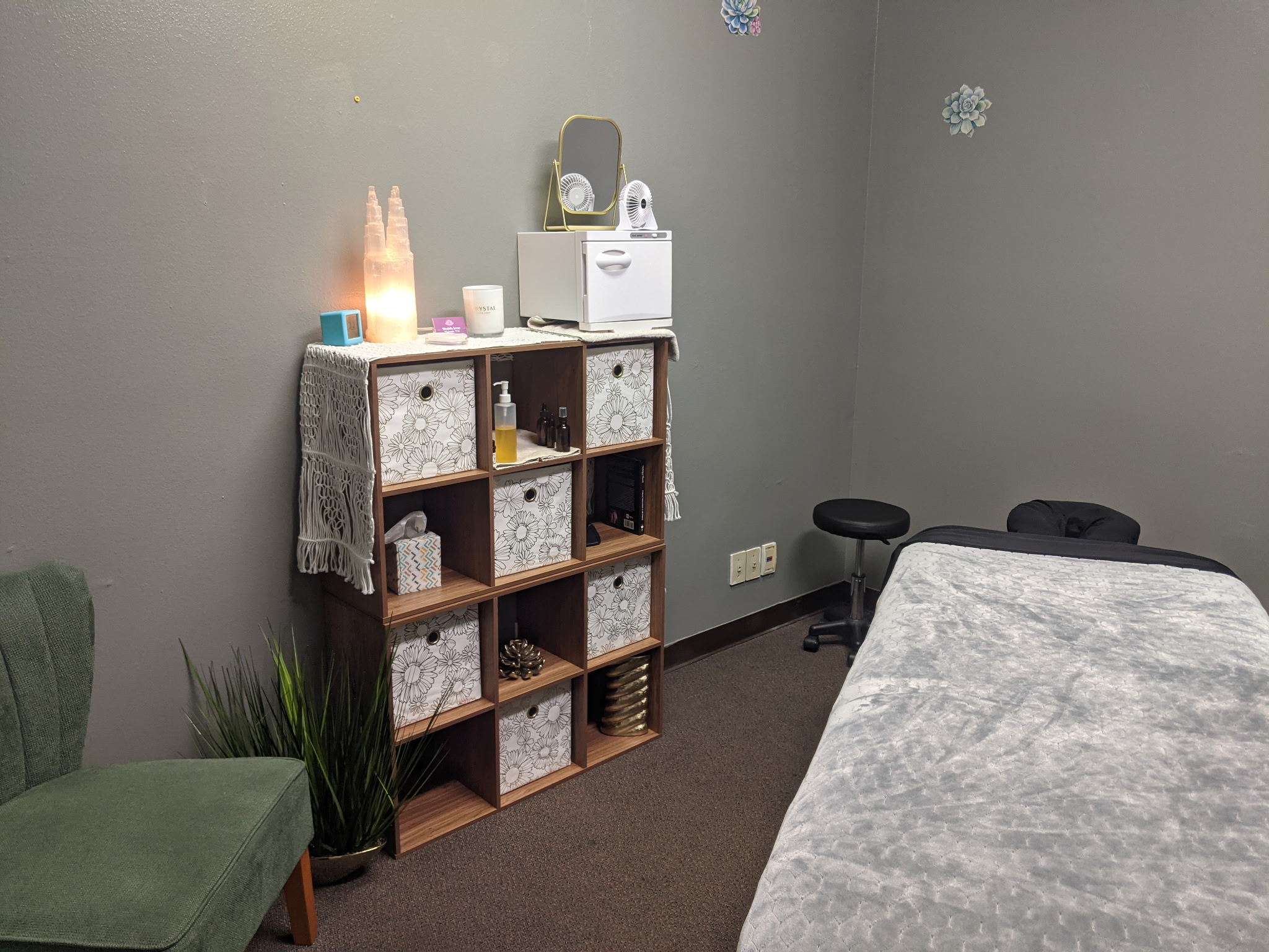 Blissfully Serene Massage treatment room with massage bed